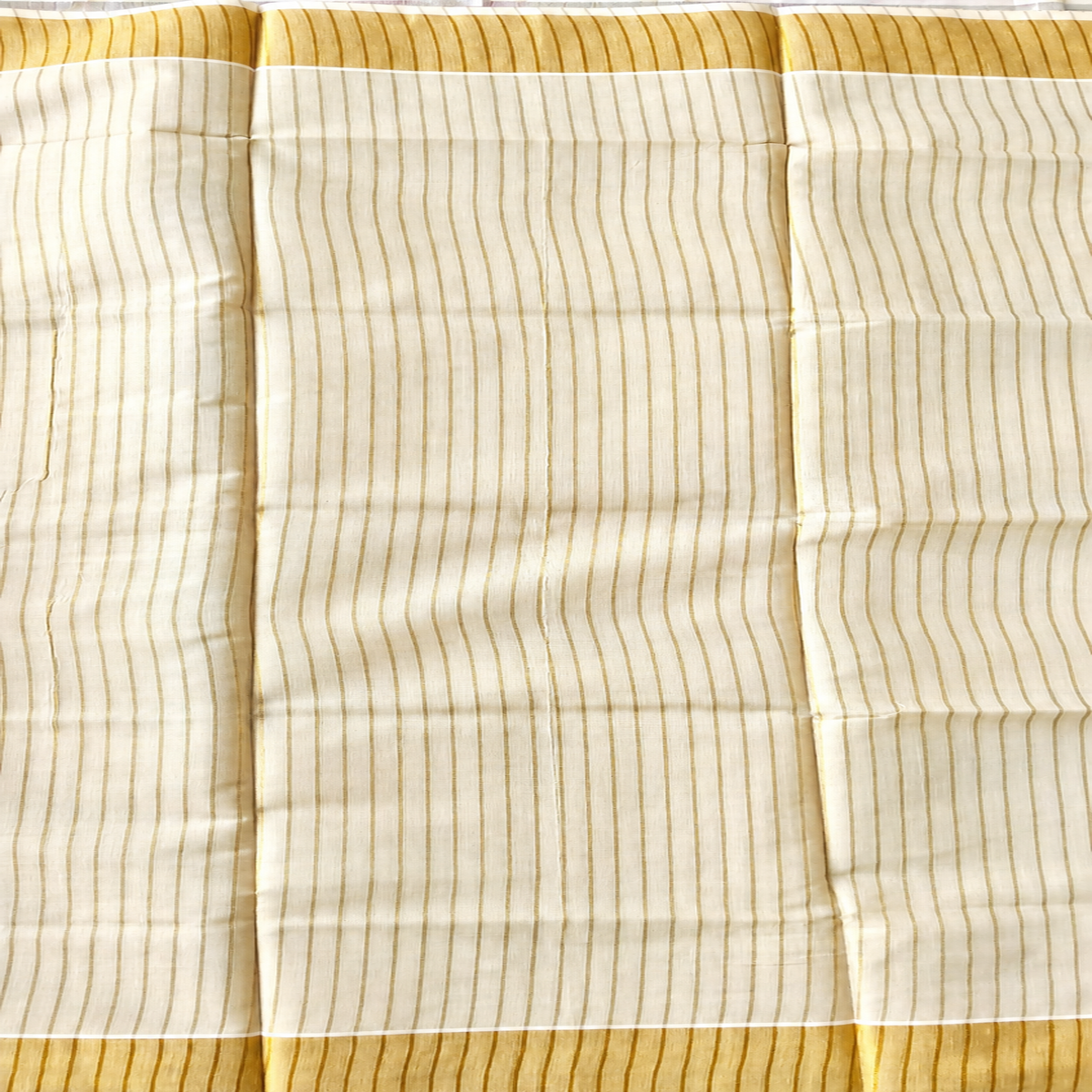 The Traditional Kerala Tissue Kasavu Saree